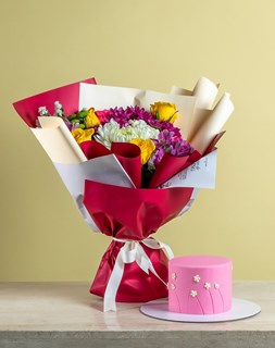 Show details for Floral Treat Delight Bouquet With Cake Picture of Floral Treat Delight Bouquet With Cake