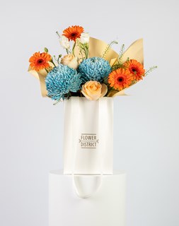 Show details for Peach Rose & Gerbera Small Bag Arrangement Picture of Peach Rose & Gerbera Small Bag Arrangement