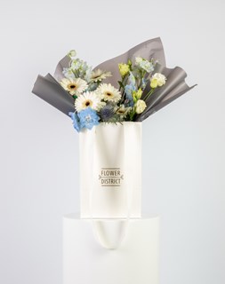 Show details for Gerbera & Delphinium Blue Small Bag Arrangement Picture of Gerbera & Delphinium Blue Small Bag Arrangement