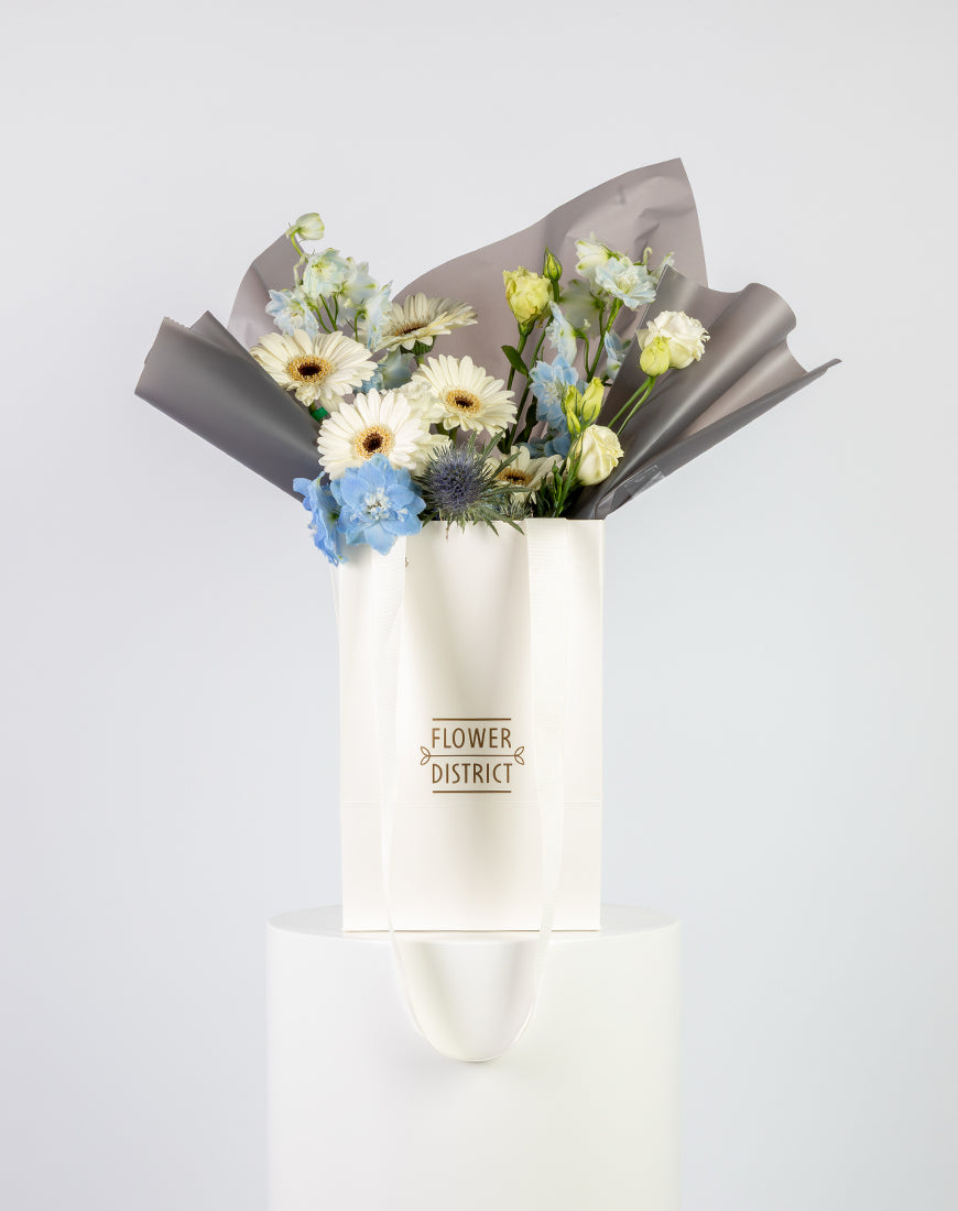 Gerbera & Delphinium Blue Small Bag Arrangement