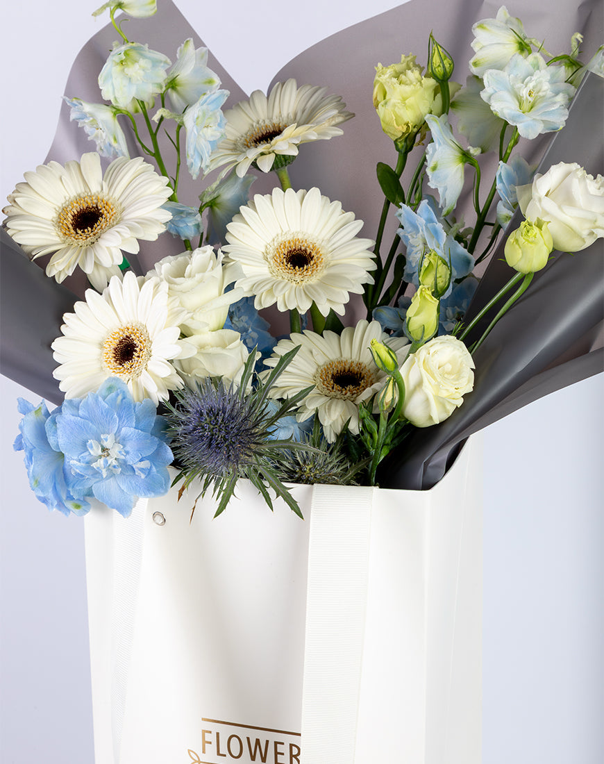 Gerbera & Delphinium Blue Small Bag Arrangement - Image 4