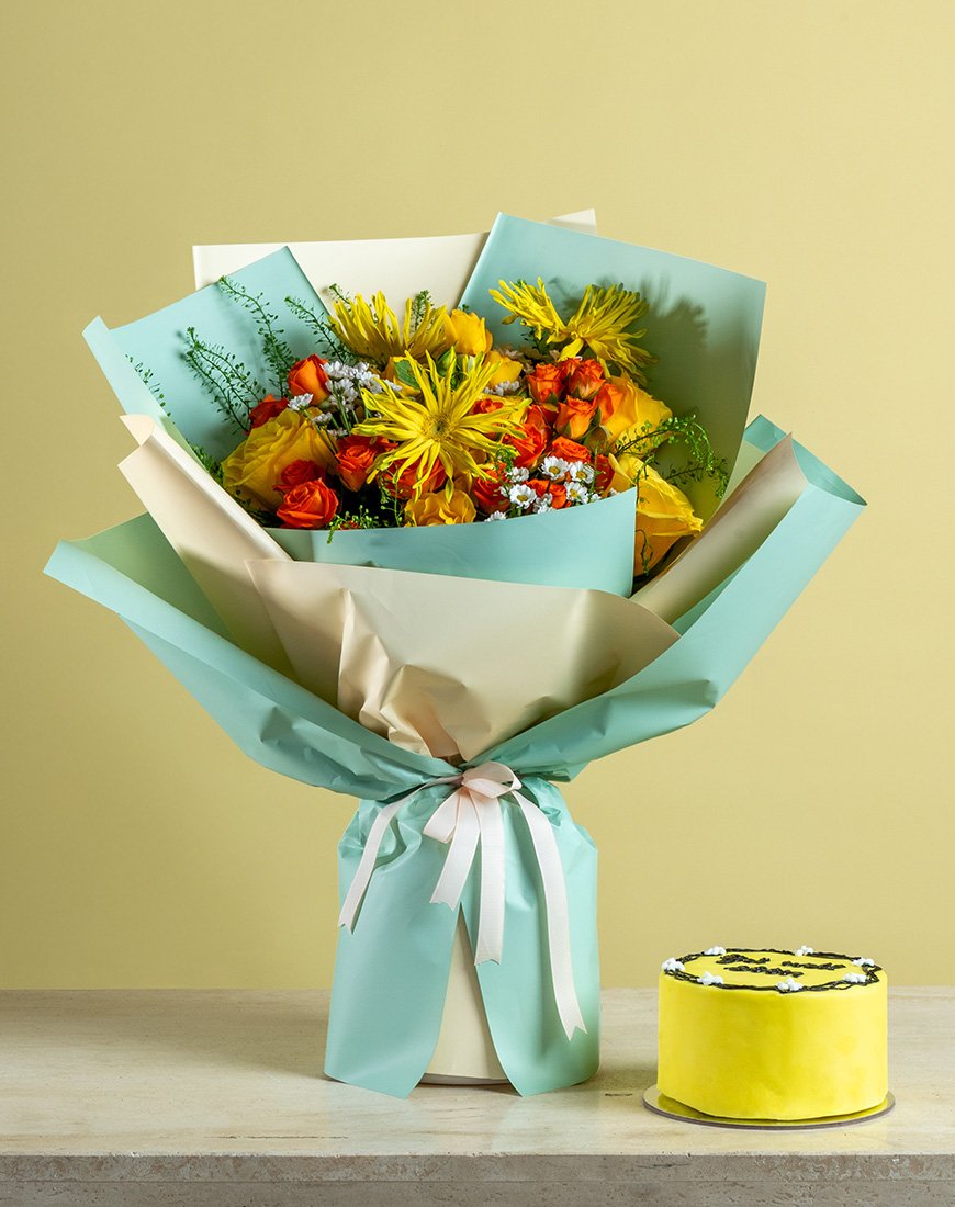 Golden Blooms & Cake Surprise Bouquet