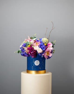 Blooming Gifts In Blue Round Box